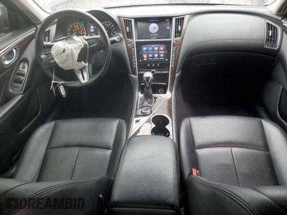 2018 Infiniti Q50 Luxe with VIN JN1EV7AR6JM441982, listed as a Copart auction lot 59939945 with 97,702 mi miles and Salvage title. Bid and sale history available at DreamBid. Image 8.