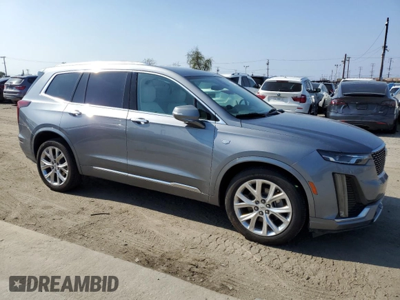 2020 Cadillac XT6 FWD Premium Luxury with VIN 1GYKPCRS5LZ201302, listed as a Copart auction lot 55103225 with 61,527 mi miles and Salvage Title. Bid and sale history available at carsss.com. Image 4.