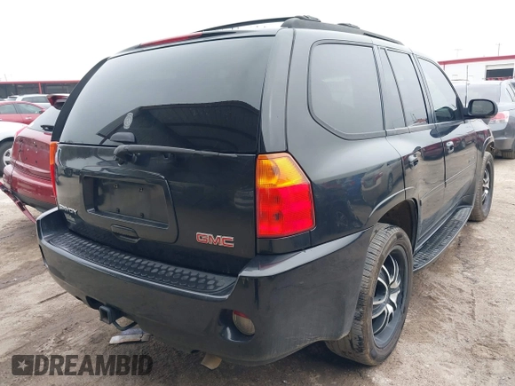 2008 GMC Envoy Denali with VIN 1GKES63M182191403, listed as a IAAI auction lot 41499601 with 217,071 mi miles. Bid and sale history available at carsss.com. Image 4.