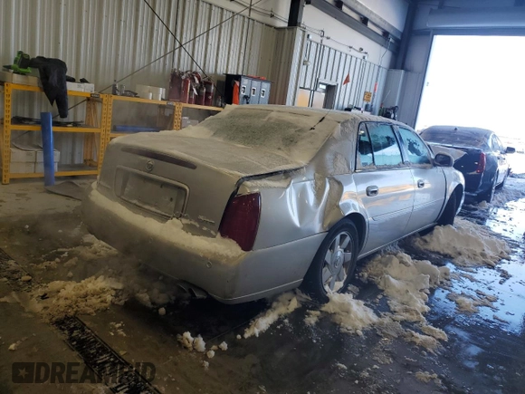 2002 Cadillac DeVille DTS with VIN 1G6KF57912U199809, listed as a Copart auction lot 87372504 with 154,663 mi miles and Salvage Title. Bid and sale history available at carsss.com. Image 3.