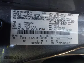 2013 Ford Focus S with VIN 1FADP3E23DL288244, listed as a IAAI auction lot 41777824 with 145,684 mi miles. Bid and sale history available at carsss.com. Image 9.