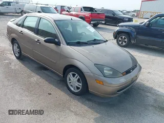 2003 Ford Focus SE with VIN 1FAFP34333W104338, listed as a IAAI auction lot 42411264 with 112,558 mi miles and . Bid and sale history available at DreamBid. Image 1.