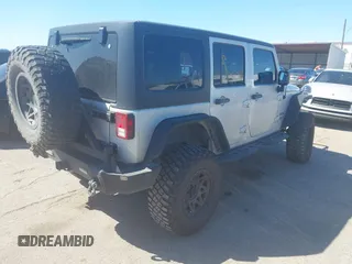 2012 Jeep Wrangler Unlimited Sport with VIN 1C4BJWDG8CL270788, listed as a IAAI auction lot 41758929 with 138,935 mi miles. Bid and sale history available at carsss.com. Image 4.