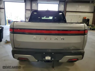 2022 Rivian R1T Adventure Package with VIN 7FCTGAAA4NN014462, listed as a Copart auction lot 73310644 with 89 mi miles and Salvage Title. Bid and sale history available at carsss.com. Image 6.