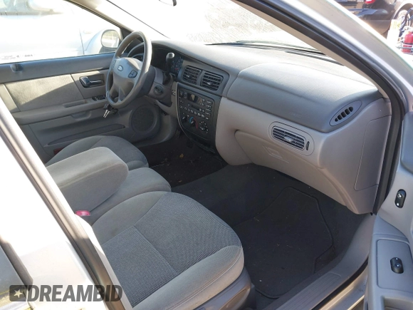 2000 Ford Taurus SE Standard z VIN 1FAFP582XYG181481, wystawiony jako IAAI lot #42033520 z przebiegiem 151 073 mil mil oraz . Historia ofert i sprzedaży dostępna na DreamBid. Obrazek 5.