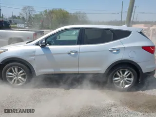2013 Hyundai Santa Fe 2.0T Sport with VIN 5XYZWDLAXDG057954, listed as a IAAI auction lot 42082667 with 186,678 mi miles. Bid and sale history available at carsss.com. Image 14.
