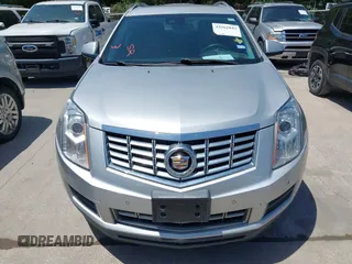 2015 Cadillac SRX Luxury Collection z VIN 3GYFNBE35FS627640, wystawiony jako IAAI lot #42262843 z przebiegiem 211 669 mil mil oraz . Historia ofert i sprzedaży dostępna na DreamBid. Obrazek 12.