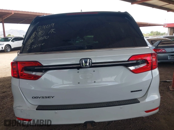 2021 Honda Odyssey Touring z VIN 5FNRL6H85MB034888, wystawiony jako IAAI lot #42386984 z przebiegiem 40 514 mil mil oraz . Historia ofert i sprzedaży dostępna na DreamBid. Obrazek 16.
