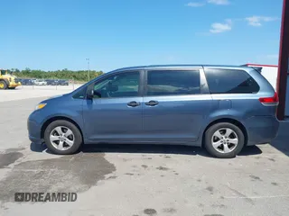 2014 Toyota Sienna L with VIN 5TDZK3DC2ES493997, listed as a IAAI auction lot 41996586 with 192,297 mi miles. Bid and sale history available at carsss.com. Image 14.