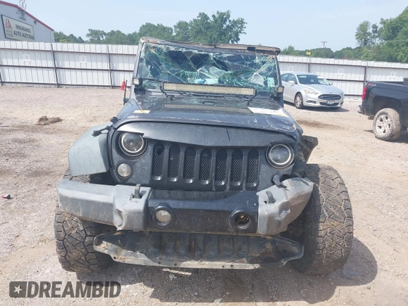 2014 Jeep Wrangler Sport with VIN 1C4AJWAGXEL233647, listed as a IAAI auction lot 39993785 with Not Provided miles and . Bid and sale history available at DreamBid. Image 13.