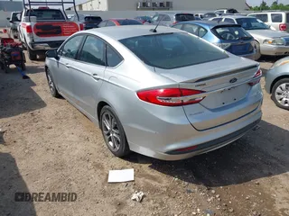 2017 Ford Fusion SE with VIN 3FA6P0HD7HR244436, listed as a IAAI auction lot 42096125 with 76,158 mi miles. Bid and sale history available at carsss.com. Image 3.