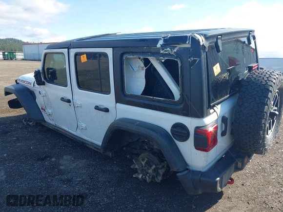 2024 Jeep Wrangler Rubicon with VIN 1C4PJXFG9RW307699, listed as a IAAI auction lot 42047562 with Not Provided miles. Bid and sale history available at carsss.com. Image 3.