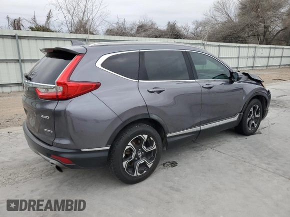 2017 Honda CR-V Touring with VIN 5J6RW2H97HL060219, listed as a Copart auction lot 45497645 with 144,724 mi miles and Salvage Title. Bid and sale history available at carsss.com. Image 3.