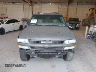 2004 Chevrolet Tahoe LS with VIN 1GNEK13ZX4J204098, listed as a IAAI auction lot 42143393 with 293,548 mi miles. Bid and sale history available at carsss.com. Image 6.