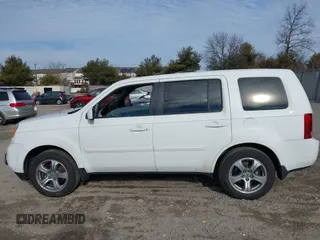 2014 Honda Pilot EX-L with VIN 5FNYF3H59EB003409, listed as a IAAI auction lot 41666126 with 170,658 mi miles. Bid and sale history available at carsss.com. Image 14.