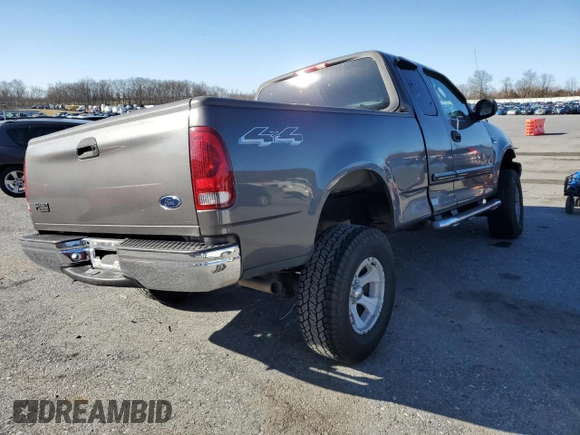 2004 Ford F-150 XL with VIN 2FTRX18W74CA39541, listed as a Copart auction lot 50390125 with Not provided miles and Salvage title. Bid and sale history available at DreamBid. Image 3.