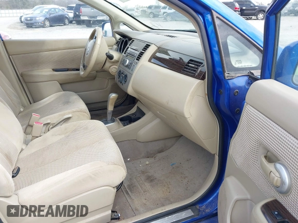 2012 Nissan Versa S with VIN 3N1BC1CP3CK250637, listed as a IAAI auction lot 41659431 with 110,031 mi miles. Bid and sale history available at carsss.com. Image 5.