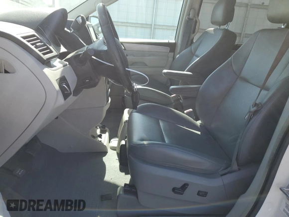 2011 Volkswagen Routan SE with VIN 2V4RW3DG5BR739944, listed as a Copart auction lot 56787495 with 84,932 mi miles and Salvage title. Bid and sale history available at DreamBid. Image 7.