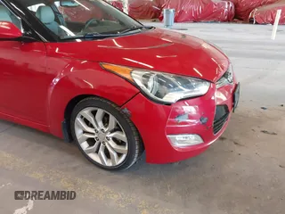 2012 Hyundai Veloster w/Gray Int z VIN KMHTC6AD3CU023998, wystawiony jako IAAI lot #42186875 z przebiegiem 170 771 mil mil oraz . Historia ofert i sprzedaży dostępna na DreamBid. Obrazek 13.