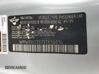 2005 MINI Convertible S with VIN WMWRH33575TK56034, listed as a Copart auction lot 88043565 with 33,410 mi miles and Salvage title. Bid and sale history available at DreamBid. Image 12.