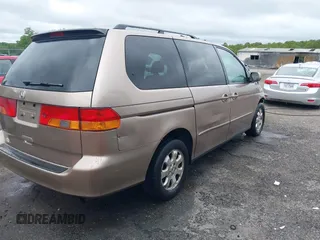 2004 Honda Odyssey EX-L z VIN 5FNRL18024B079462, wystawiony jako IAAI lot #42227175 z przebiegiem 267 661 mil mil oraz . Historia ofert i sprzedaży dostępna na DreamBid. Obrazek 4.