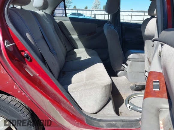 2004 Toyota Corolla CE with VIN JTDBR38E442046280, listed as a IAAI auction lot 39261107 with 212,717 mi miles and . Bid and sale history available at DreamBid. Image 8.