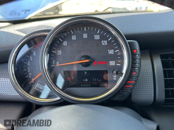 2015 MINI Hardtop 4 Door with VIN WMWXS5C5XFT831166, listed as a Copart auction lot 56714285 with 69,668 mi miles and Salvage Title. Bid and sale history available at DreamBid. Image 8.