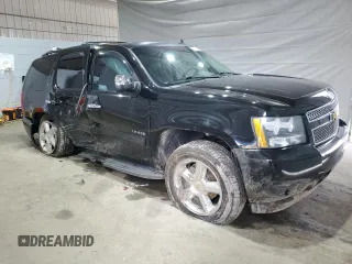 2013 Chevrolet Tahoe LT with VIN 1GNSKBE07DR174163, listed as a Copart auction lot 55501635 with 183,829 mi miles and Salvage title. Bid and sale history available at DreamBid. Image 4.