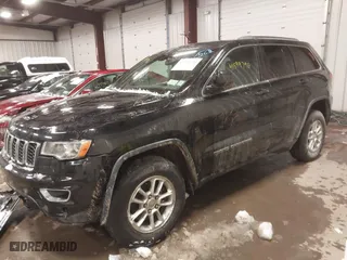 2018 Jeep Grand Cherokee Laredo E with VIN 1C4RJFAG3JC334865, listed as a IAAI auction lot 41599796 with 127,591 mi miles. Bid and sale history available at carsss.com. Image 2.