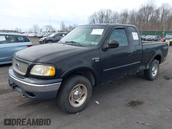 2000 Ford F-150 XL with VIN 1FTRX18WXYNC25817, listed as a IAAI auction lot 41976618 with 148,794 mi miles and . Bid and sale history available at DreamBid. Image 2.