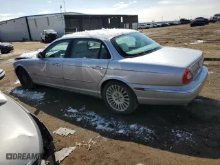 2005 Jaguar XJ VDP with VIN SAJWA82C25SG42104, listed as a Copart auction lot 67504384 with 167,921 mi miles and Salvage Title. Bid and sale history available at carsss.com. Image 2.