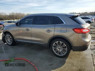 2016 Lincoln MKX Reserve z VIN 2LMPJ6LR7GBL74185, wystawiony jako Copart lot #87799275 z przebiegiem 89 977 mil mil oraz Szkoda całkowita • Salvage title. Historia ofert i sprzedaży dostępna na DreamBid. Obrazek 2.