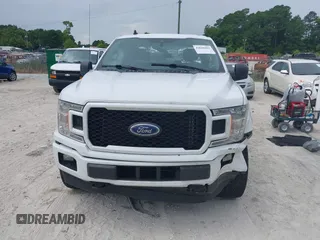 2020 Ford F-150 XL z VIN 1FTEW1EP3LFA05453, wystawiony jako IAAI lot #42644402 z przebiegiem 163 933 mil mil oraz . Historia ofert i sprzedaży dostępna na DreamBid. Obrazek 12.