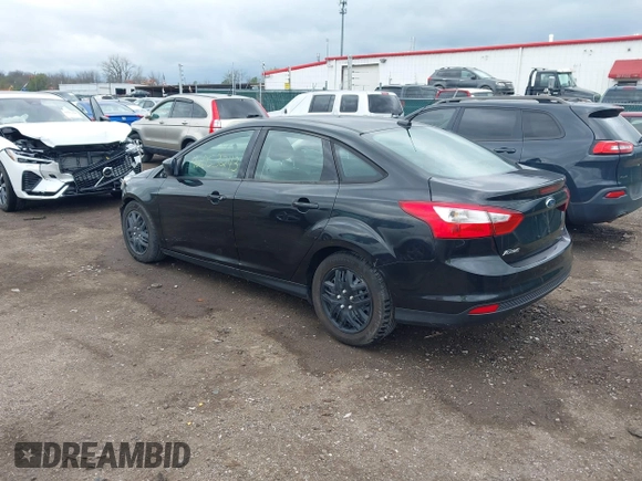 2012 Ford Focus SE with VIN 1FAHP3F27CL112277, listed as a IAAI auction lot 42053243 with 104,885 mi miles. Bid and sale history available at carsss.com. Image 3.