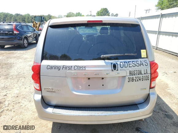 2015 Dodge Grand Caravan SE with VIN 2C4RDGBG8FR657996, listed as a Copart auction lot 52040245 with 186,754 mi miles and Salvage Title. Bid and sale history available at carsss.com. Image 6.