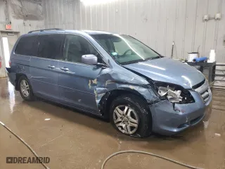 2005 Honda Odyssey EX-L with VIN 5FNRL38775B133803, listed as a Copart auction lot 51826685 with 141,867 mi miles and Salvage Title. Bid and sale history available at carsss.com. Image 4.
