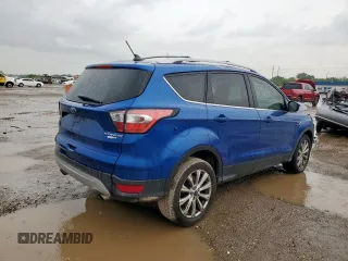 2018 Ford Escape Titanium with VIN 1FMCU9J98JUB31234, listed as a Copart auction lot 58817705 with 140,183 mi miles and Salvage title. Bid and sale history available at DreamBid. Image 3.