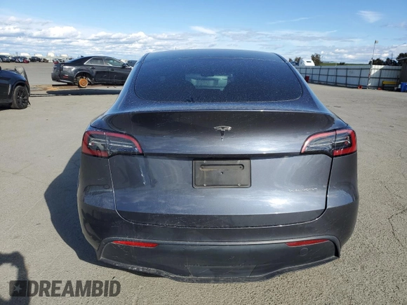 2023 Tesla Model Y Long Range with VIN 7SAYGDEE9PF638742, listed as a Copart auction lot 48188455 with 30,550 mi miles and Salvage Title. Bid and sale history available at DreamBid. Image 6.