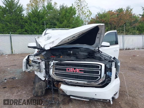 2019 GMC Yukon XL SLT with VIN 1GKS2GKC2KR369285, listed as a IAAI auction lot 40279008 with Not Provided miles and . Bid and sale history available at DreamBid. Image 6.