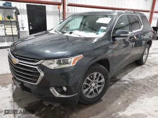 2019 Chevrolet Traverse LT Cloth with VIN 1GNEVGKW7KJ111442, listed as a IAAI auction lot 41356321 with 153,940 mi miles. Bid and sale history available at carsss.com. Image 2.