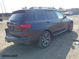 2022 BMW X7 M50i with VIN 5UXCX6C03N9M51772, listed as a IAAI auction lot 41780026 with 26,001 mi miles. Bid and sale history available at carsss.com. Image 4.