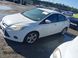 2014 Ford Focus SE with VIN 1FADP3F20EL150757, listed as a IAAI auction lot 41984703 with 171,603 mi miles. Bid and sale history available at carsss.com. Image 2.