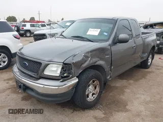 2003 Ford F-150 XL with VIN 1FTRX07W33KB50920, listed as a IAAI auction lot 41742906 with 100,560 mi miles and . Bid and sale history available at DreamBid. Image 2.