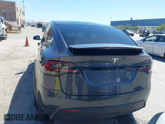 2022 Tesla Model X with VIN 7SAXCAE59NF360301, listed as a IAAI auction lot 41945059 with Not Provided miles and . Bid and sale history available at DreamBid. Image 16.