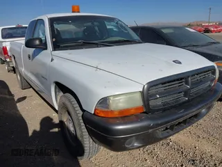 2002 Dodge Dakota with VIN 1B7GL12X32S701273, listed as a IAAI auction lot 41552573 with 157,212 mi miles and . Bid and sale history available at carsss.com. Image 1.