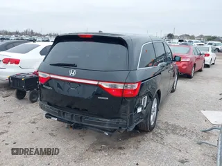 2013 Honda Odyssey Touring with VIN 5FNRL5H9XDB073706, listed as a IAAI auction lot 41591111 with 158,305 mi miles and . Bid and sale history available at carsss.com. Image 4.
