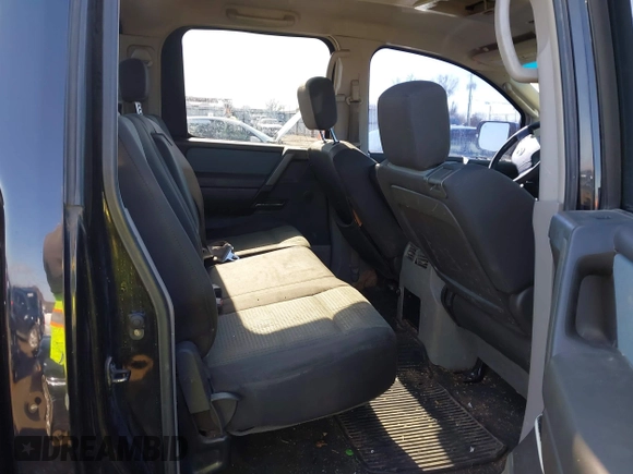 2004 Nissan Titan LE with VIN 1N6AA07A44N591357, listed as a IAAI auction lot 41464024 with 296,954 mi miles and . Bid and sale history available at DreamBid. Image 8.