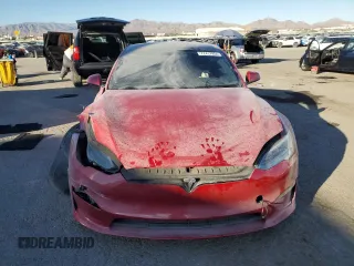 2021 Tesla Model S Plaid z VIN 5YJSA1E65MF435922, wystawiony jako Copart lot #77417854 z przebiegiem Nie podano mil oraz Szkoda całkowita • Salvage title. Historia ofert i sprzedaży dostępna na DreamBid. Obrazek 5.
