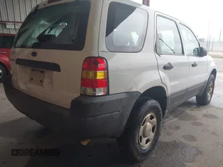 2004 Ford Escape XLS with VIN 1FMYU02134DA08567, listed as a IAAI auction lot 41872076 with 239,602 mi miles and . Bid and sale history available at DreamBid. Image 4.
