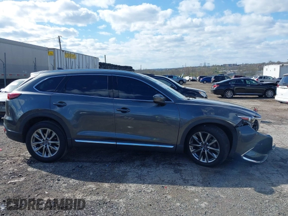 2019 Mazda CX-9 Signature with VIN JM3TCBEYXK0324257, listed as a IAAI auction lot 41986590 with Not provided miles and . Bid and sale history available at DreamBid. Image 13.